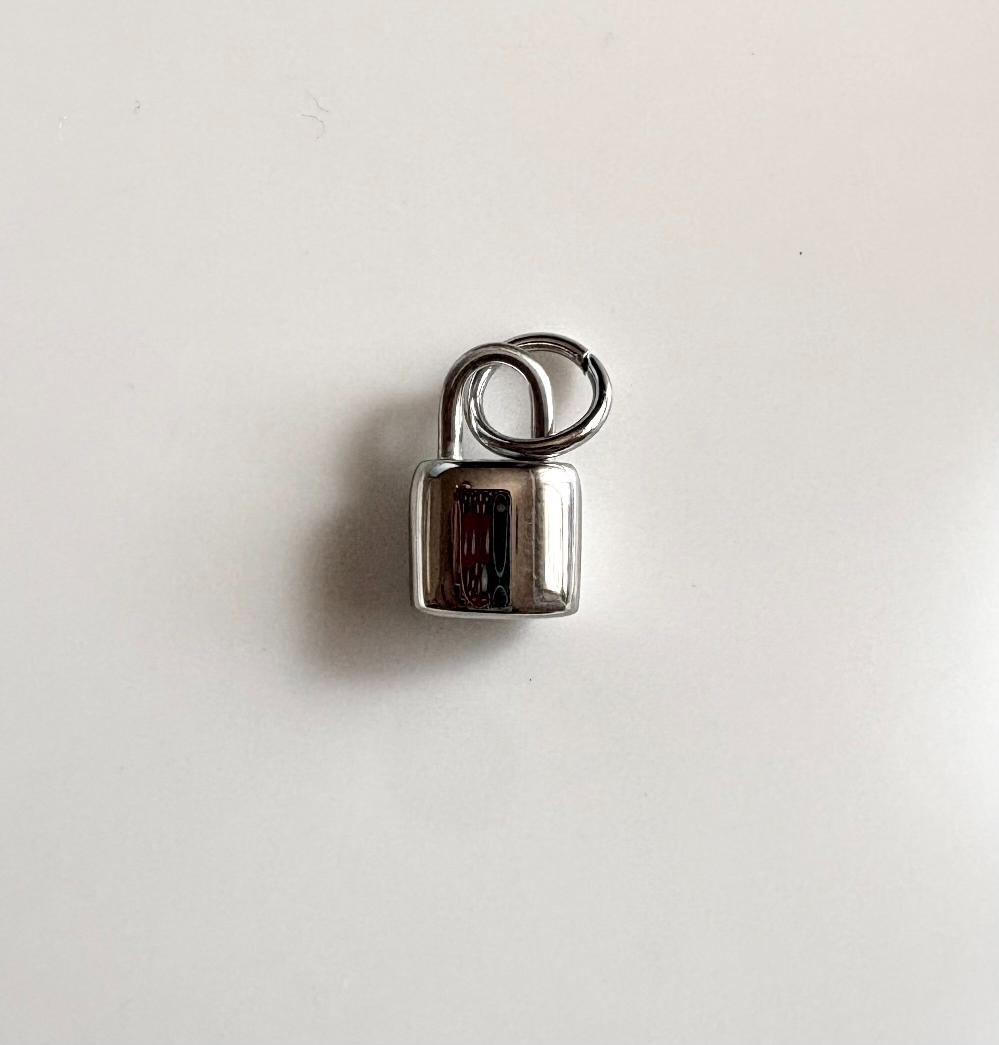 Silver lock Charm